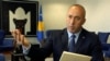 Kosovar Prime Minister Ramush Haradinaj gestures during an interview with RFE/RL in March.