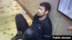 Арман Жумагелдиев камакка алынган учур. Январь, 2022-жыл.
