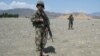Soldiers from the Afghan National Army (ANA) patrol the vicinity of Jalalabad.