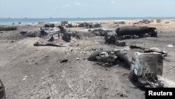 Йемендеги Рас-Иса порту 18-апрелдеги соккудан кийин.