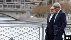 АКШ мамкатчысы Жон Керри менен Ирандын тышкы иштер министри Жавад Зариф. 