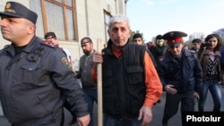 Armenian opposition activist Shant Harutiunian leads an antigovernment demonstration from Yerevan's Liberty Square on November 5, 2013.
