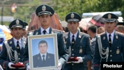 Armenia - The funeral in Yerevan of Yuri Tepanosian, an Armenian police officer killed in a standoff between security forces and opposition gunmen, 1Aug2016.