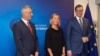 EU foreign policy chief Federica Mogherini (center), Kosovo President Hashim Thaci (left), and his Serbian counterpart, Aleksandar Vucic, in Brussels on August 31