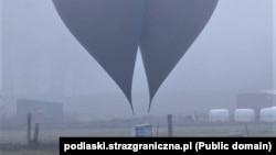 Poland - Border Guard uncovered a package of 3000 packs of cigarettes attached to two meteorological balloons, Klimowka, 10Nov2025