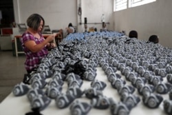 Производство респираторов в Сан-Паулу