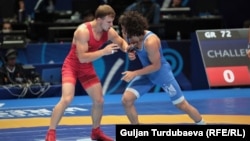 Архив.  Кыргызстандык балбан Руслан Царев көк кийимчен. 14-сентябрь, 2019-ж.