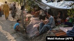 Içerki bosgunlyga sezewar bolan owgan maşgalalary. 11-nji awgust, 2021 ý. Kabul, Owganystan.1