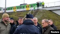 Польшанын премьер-министри Дональд Туск окуя болгон жерде. 