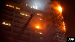 Горит здание компании Enel в Сантьяго. 18 октября 2019