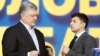 Кандидати на посаду президента України Петро Порошенко і Володимир Зеленський (праворуч) під час дебатів на стадіоні «Олімпійський». Київ, 19 квітня 2019 року