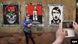 Графіті стріт-арт-художника Sociopath «Трилогія війни». Львів, 9 травня 2014 року (ілюстраційне фото)