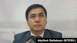 Каныбек Иманалиев.