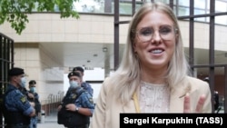 Lyubov Sobol leaves a hearing at a court in Moscow in August.