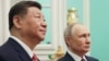 Russian President Vladimir Putin (right) and Chinese President Xi Jinping meet in Moscow in May.