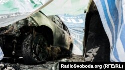 Спалені машини Спеціальної моніторингової місії ОБСЄ у Донецьку. 9 серпня 2015 року