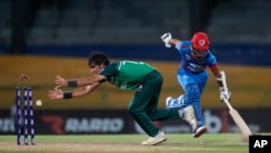 اعضای تیم‌های کریکت افغانستان و پاکستان 