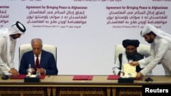 مراسم امضای توافقنامه آوردن صلح به افغانستان میان امریکا و طالبان در قطر