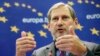 Johannes Hahn​, the ommissioner for European neighborhood policy and enlargement negotiations, speaks to the media in Sarajevo on December 4.