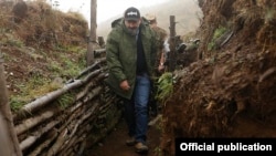 Nagorno-Karabakh - Armenian Prime Minister Nikol Pashinian walks through Karabakh Armenian trenches on "the line of contact" with Azerbaijan, September 18, 2018.