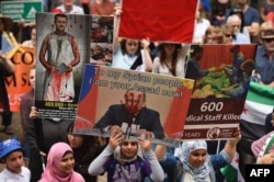 Одна з численних мирних демонстрацій проти російського військового втручання в Сирії. Сідней, жовтень 2015 року