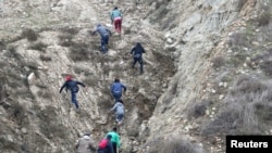 АКШга Мексика аркылуу мыйзамсыз кирүүгө аракеттенген мигранттар. 9-декабрь, 2018-жыл.