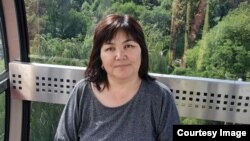 Аскер Сакыбаева.