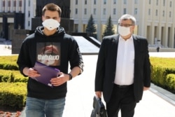 Віктар Бабарыка з сынам Эдуардам