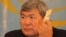 Тохтар Аубакиров в бытность активистом Общенациональной социал-демократической партии "Азат" голосует на предвыборном съезде партии. Алматы, 26 ноября 2011 года. 