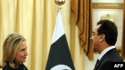 Ҳилларӣ Клинтон ва Юсуф Ризо Гелонӣ