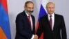 Armenian Prime Minister Nikol Pashinian (left) meets with Russian President Vladimir Putin in Sochi in May.