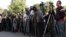 Armenia -- Television cameramen at an opposition rally in Yerevan in 2011.