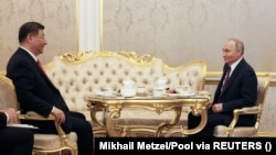 Си Цзинпин менен Владимир Путин. Кы