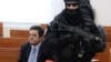 Four Accused In Slovak Journalist's Killing Appear In Court