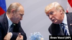 Путин менен Трамп G-20 саммитинде жолуккан кез. 2017-жыл, июль, Германия.