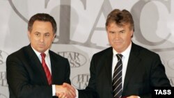 После назначений в правительстве к президенту РФС и новоиспеченному министру Виталию Мутко (слева) возникли дополнительные вопросы