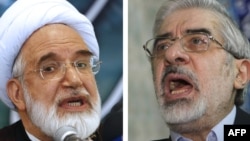 Mir Huseýin Musawi bilen Mehdi Karrubi (çepde)