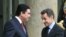 Fransiýanyň prezidenti Nikolas Sarkozy (sagda) we Türkmenistanyň prezidenti Gurbanguly Berdimuhamedow (çepde) günortanlyk naharynyň öňüsyrasynda, 1-nji fewral, 2010-njy ýyl.