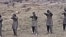 Tajik militants appear in a video purportedly training in Pakistan, where Jamaat Ansarullah was founded in 2006 by former members of the Islamic Movement of Uzbekistan (IMU).