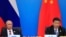 Қытай президенті Си Цзиньпин (оң жақта) мен Ресей президенті Владимир Путин. Көрнекі сурет.