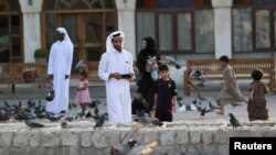 Доха шаарынын тургундары. 6-июнь, 2017-жыл. 