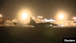 Российские боевые самолеты призмеляются на сирийском аэродроме. 1 октября