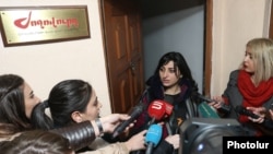 Armenia -- Taguhi Tovmasian, a parliament deputy and the founder of "Zhoghovurd" daily, speaks to reporters at the entrance to its offices, Yerevan, December 19, 2019.