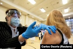 آرشیف، تطبیق واکسین کرونا