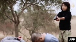 Подросток, предположительно из Казахстана, в видеоролике о казни "агентов российских спецслужб".