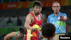 Арсен Эралиев коло байге үчүн таймаш учурунда. 15-август, 2016-жыл. Рио-де-Жанейро. Бразилия.