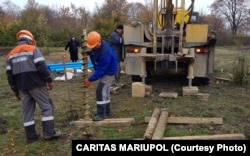 Работа геологической экспедиции в населенном пункте буферной зоны