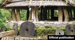 Йап аралдарынын эли колдонгон таш акчалар.