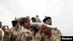 Ирактын күчтөрү Мосулга жакын аймактарда. 25-март, 2016-жыл.