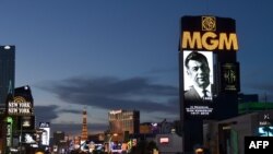 Marquees on the Las Vegas Strip, including the MGM Grand Hotel & Casino, show video tributes to billionaire investor Kirk Kerkorian on June 16, 2015.